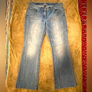 Straight Leg Jeans. Buttons to the Left